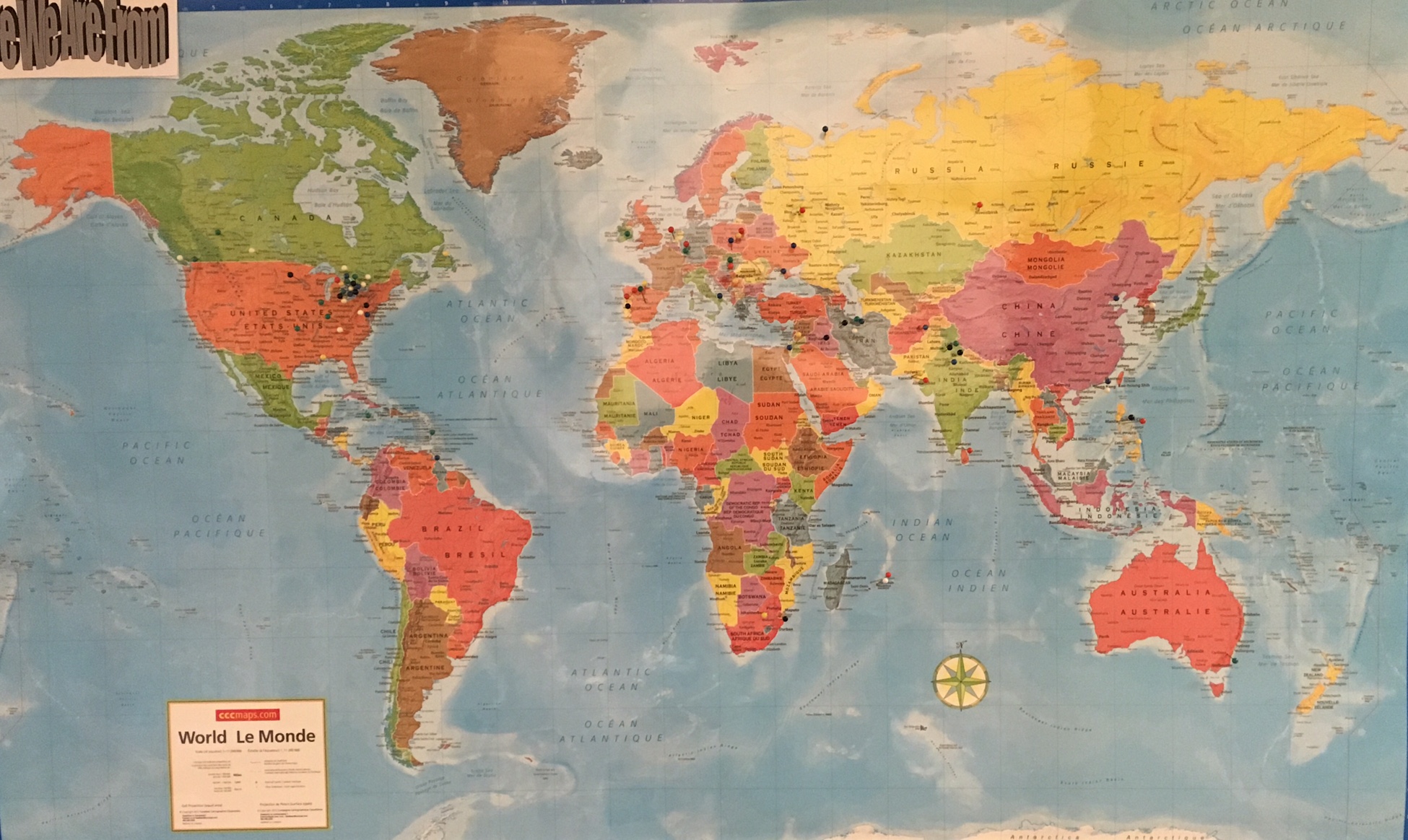Map of the world with pins indicating where lab members are from